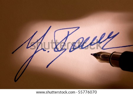 Manual signature with pen in a letter