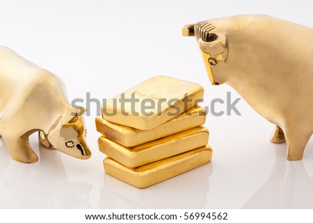 Bull and bear markets symbols with gold bars