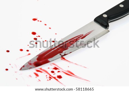 A knife smeared with blood. A murder weapon. Photo icon Crime
