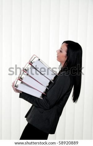 Deprived women with stress and files in the office