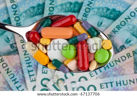 Swedish krona, the currency of Sweden. With tablets. Health costs.