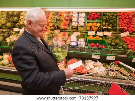 a senior shopping for food in the supermarket