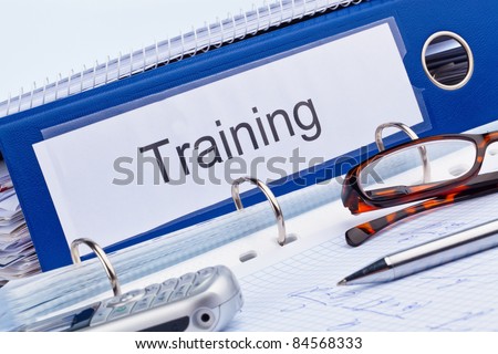 an icon picture for further education, training and adult education. folder and documents in a seminar