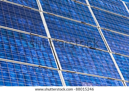 solar collectors for power generation on the roof of a company