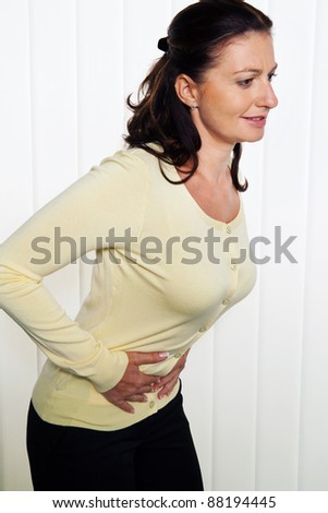 woman with pain in the abdomen and groin. menstrual pain.