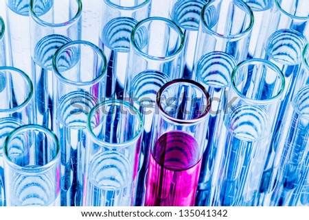 many test tubes in a test in a research laboratory of a university. symbol photo and learn for research.