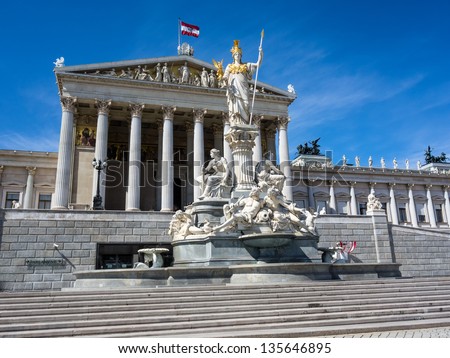 the parliament in vienna, austria. with the statue of \
