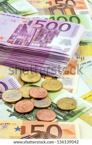 many euro banknotes. symbolic photo for wealth and investment.