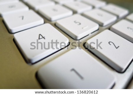 the keys of a computer in close-up. data processing and the internet.
