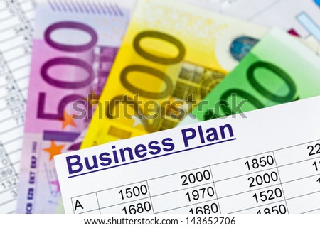 a business plan for starting a business. ideas and strategies for self-employment. euro banknotes.