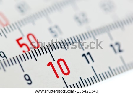a white ruler of a carpenter is isolated on a white background.
