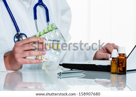 a doctor issues a prescription for medication. prescription tablets from the pharmacy.