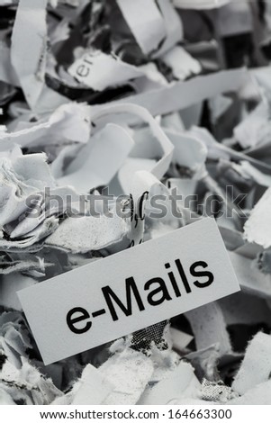 shredded paper tagged with e-mails, symbol photo for data destruction, mails and data flooding