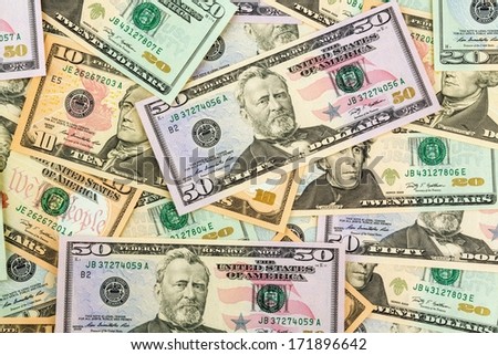many american dollar bills. symbol photo for r debts and wealth