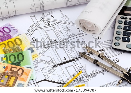 an architect's blueprint with a calculator and euro money. symbolic photo for funding and planning of a new house.