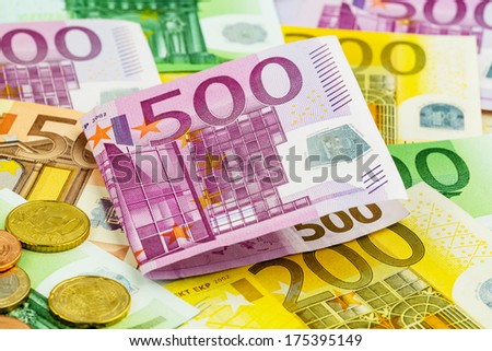 many different euro bills. symbolic photo for wealth and investments.