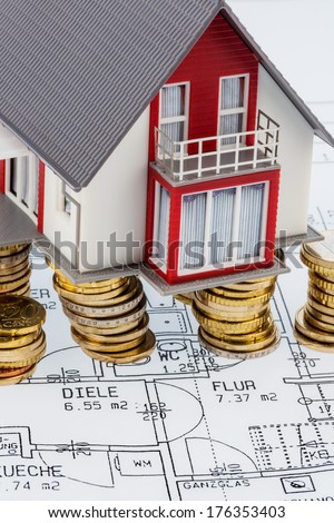 residential house on blueprint symbol photo for house construction, financing, building society