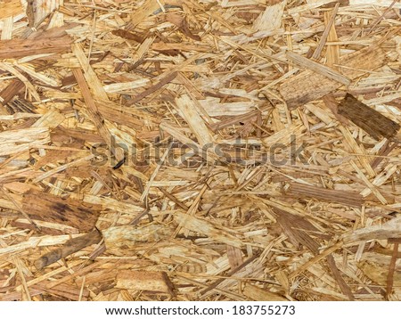 an empty poster stand made of pressed wood shavings. copy space and background