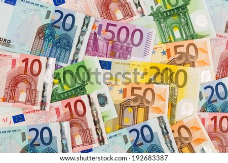 many different euro bills. symbolic photo for wealth and investments.