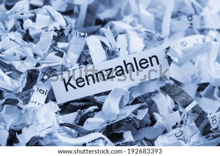 shredded paper for keyword metrics, symbol photo for data destruction, business and economic development