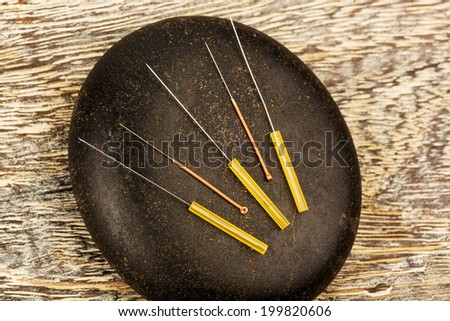 several needle for acupuncture are adjacent. traditional chinese medicine (alternative medicine).