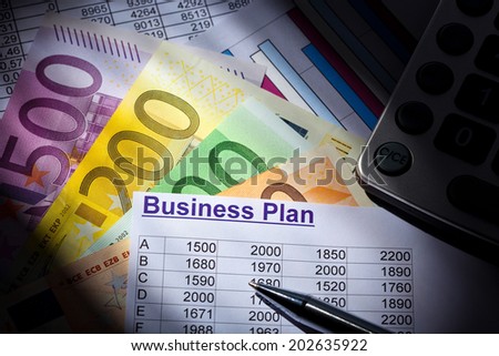 a business plan for starting a business. ideas and strategies for self-employment. euro banknotes and calculator