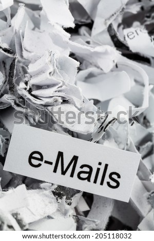 shredded paper tagged with e-mails, symbol photo for data destruction, mails and data flooding
