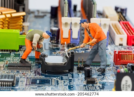computer board and workers, symbol photo for computer failure, maintenance, data security