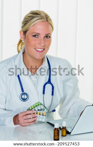 a young doctor in the ordination in their doctor\'s office.