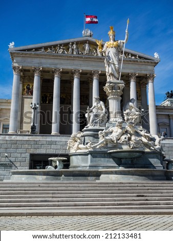 the parliament in vienna, austria. with the statue of 