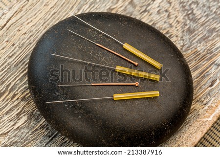 several needle for acupuncture are adjacent. traditional chinese medicine (alternative medicine).