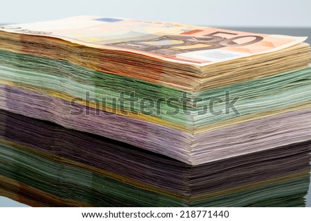 many different euro bills. symbol photo for wealth and investment