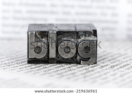the word blog written with lead letters. symbol photo for blog
