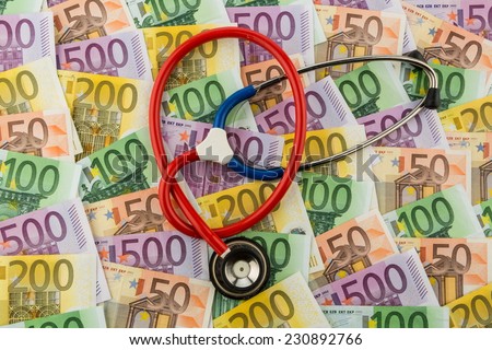 stethoscope and euro banknotes. symbol photo for costs in health care and health insurance for medical and