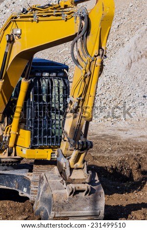 excavator on a construction site. excavator bucket with soil, earth works.