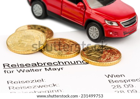 a settlement of travel expenses with car and euro coins