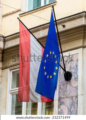 the european union (eu) flag and the austrian flag.