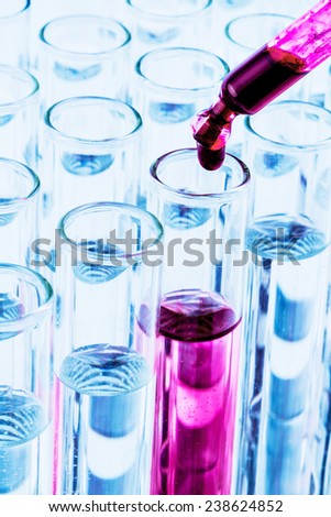 many test tubes for an experiment in a research laboratory of a university. learning and research symbolic photo for.