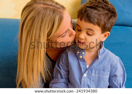 a little boy eating a banana. representative photo of food