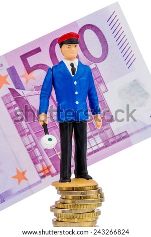 railway worker on money stack symbol photo for early retirement, costs for rail
