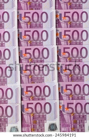 many of five hundred euro banknotes are adjacent. photo icon for wealth and investment