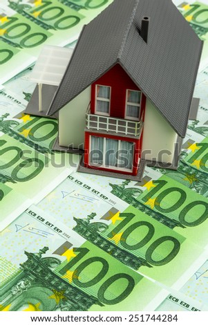 house on banknotes, symbolic photograph for home purchase, financing, building society