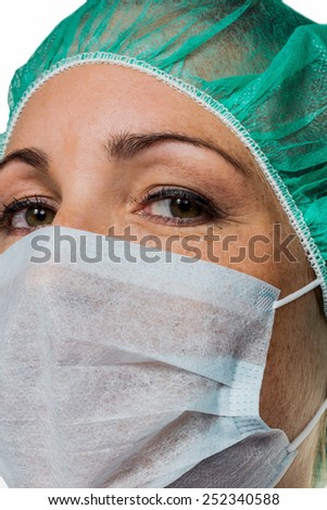 a nurse or doctor in surgical clothing before surgery. symbolic photo for stress and overtime in the hospital.