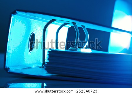 file folder with documents and documents. retention of contracts.