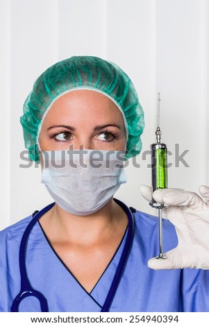 a nurse or doctor in surgical clothing before surgery. symbolic photo for work in the hospital.