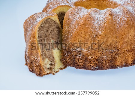 a marble cake for dessert. symbolic photo for taxes, fees and shares