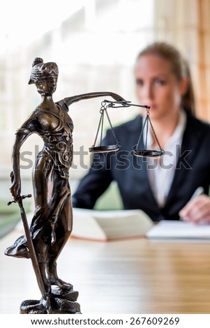 businesswoman sitting in an office. photo icon for managers, independence or lawyer.