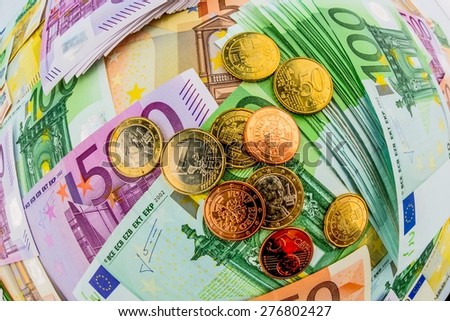 many different euro bills. symbolic photo for wealth and investment.