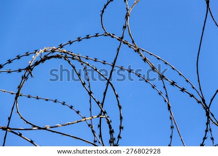 a plot of land is covered with barbed wire
