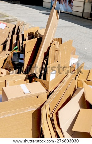 cartons waiting to be picked up by the garbage trucks. recycling of waste paper.